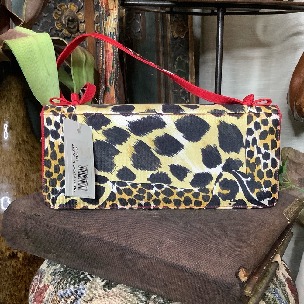 STUART WEITZMAN Red and leopard print purse